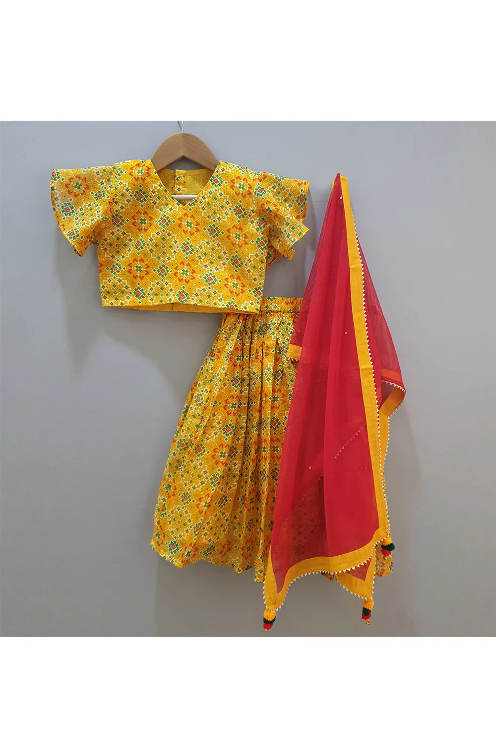 Yellow bandhani top and skirt with dupatta