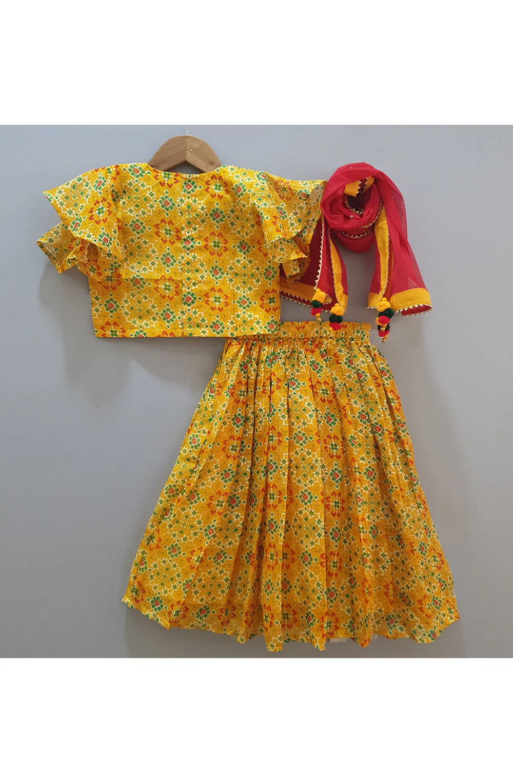 Yellow bandhani top and skirt with dupatta