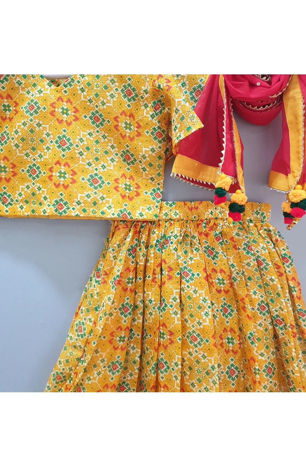 Yellow bandhani top and skirt with dupatta